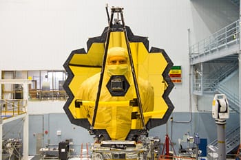 scott acton is reflected in the primary mirror of the James Webb Space Telescope