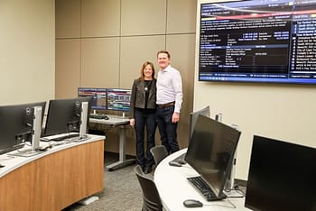 The Swinneys in the new Financial Markets Lab.