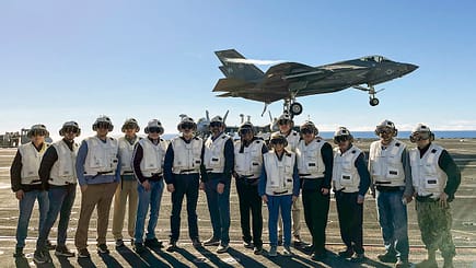 Dr. Rusty Towell aboard a U.S. Navy aircraft carrier