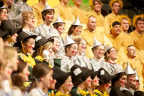 The senior class in 2013 perform as the Scarecrow, Tin Man and Cowardly Lion.