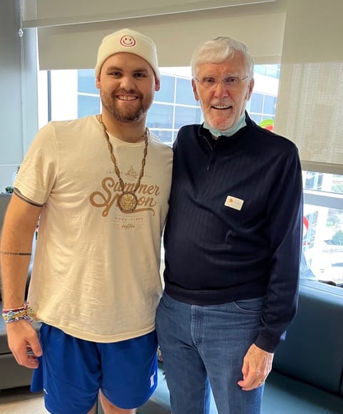 Earl Young ('62) and Kade Parmelly at UT Southwestern.