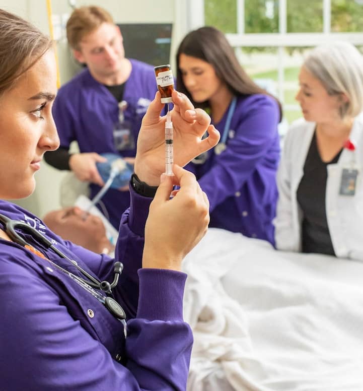 nursing students and faculty Abilene Christian University doing a simulation lab