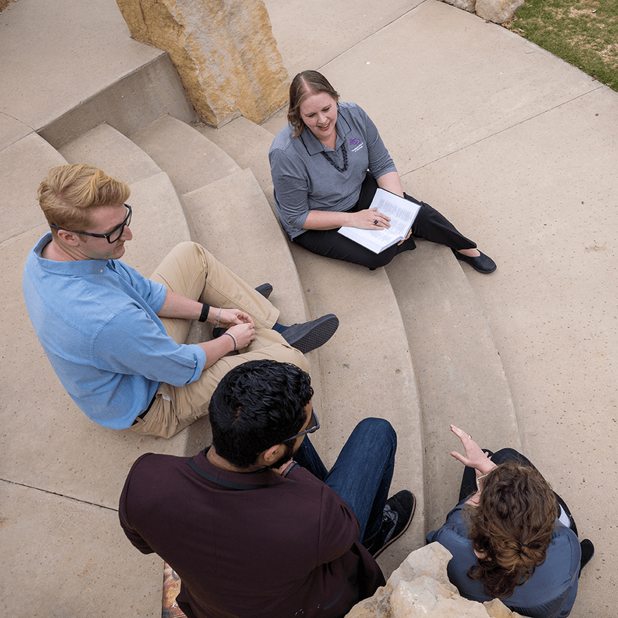 Group studying on steps for divinity equivalency program